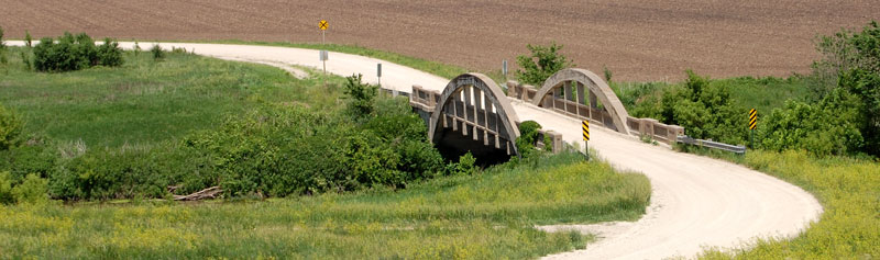 Arch bridge over the Cottonwood river near Strong City, Kansas by Kathy Alexander.