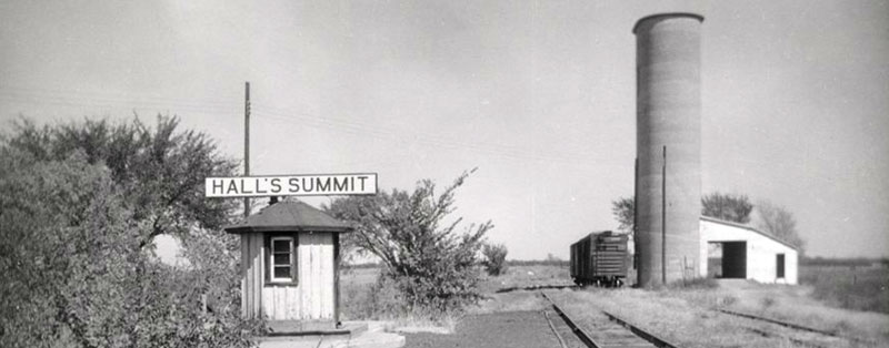 Atchison, Topeka & Santa Fe Railroad shed depot in Hall's Summit, Kansas by H. Killam, 1952.