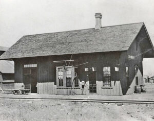 Atchison, Topeka & Santa Fe Railroad depot in Conway, Kansas, about 1900.