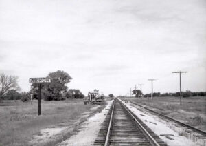 Railroad signboard in Akron, Kansas by H. Killam, 1964.