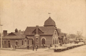 Atchison, Topeka & Santa Fe Railroad in Arkansas City, Kansas by Croft & Cusick, 1890.