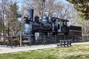 An old Garden City Western Railway steam locomotive and coal tender are displayed ina park in Garden City, Kansas by Carol Highsmith.