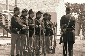 Black soldier re-enactors at Fort Scott, Kansas courtesy National Park Service.