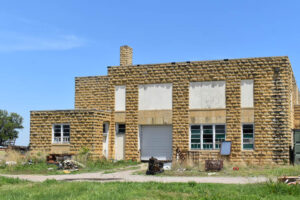 The old Bunker Hill School in Russell County, Kansas appears to be used for storage today. Photo by Kathy Alexander.