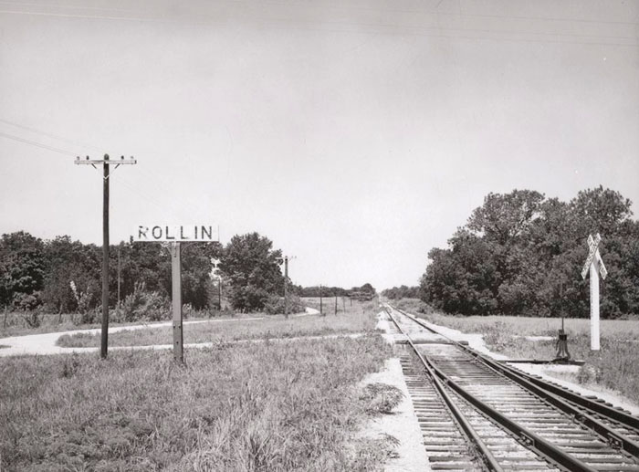 Atchison, Topeka & Santa Fe Railroad crossing by H. Killam, 1962.