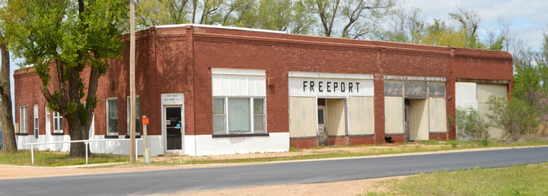 Business row in Freeport, Kansas by Kathy Alexander.