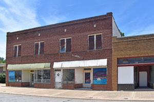 Business Buildings in Oxford, Kansas by Kathy Alexander.