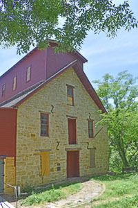 Old Oxford Mill in Oxford, Kansas by Kathy Alexander.