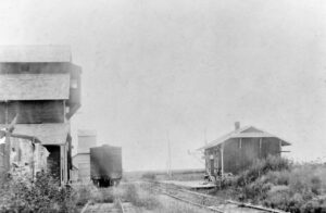 Atchison, Topeka & Santa Fe Railroad Depot in Portland, Kansas, about 1890.