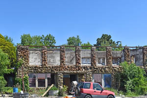 An old stone building in Detroit, Kansas by Kathy Alexander.