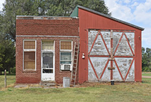 Old business building in Bridgeport, Kansas by Kathy Alexander.