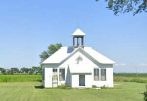 This old school was erected on the prairies just south of Ames, Kansas in 1910. Photo courtesy of Google Maps.