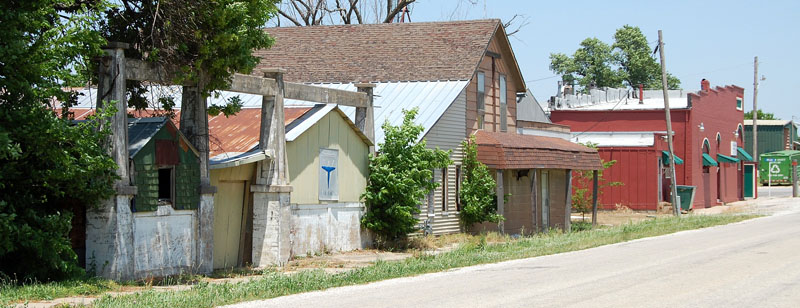 Main Street buildings in Colony, Kansas by Kathy Alexander.