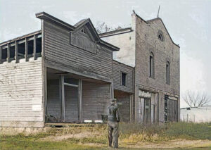 Abandoned stores in Shaw, Kansas by John Vachon, 1940.