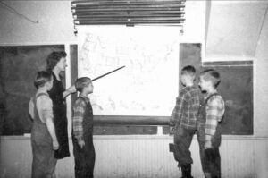 Students at the old Dewey School in Harvey County, Kansas.