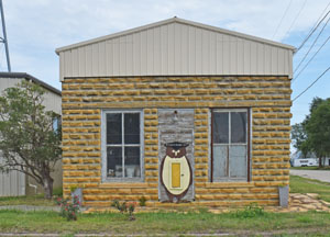 O.J. Quy's hardware store once stood in Omio before it was moved to Formosa. Today the building is utilized by the Water Department. Photo by Kathy Alexander.