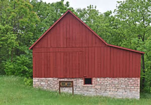 This red barn was built in 1860 by John McKimmons and placed on the National Register of Historic Places in 2010. It stands just southeast of Westmoreland on Kansas Route 99 near the Rock Creek Bridge.