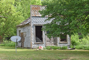 Old business building in Willis, Kansas by Kathy Alexander.