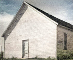 The first Catholic Church in Densmore , Kansas.