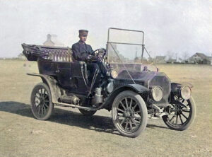 Edwin Boyer driving his Buick in Grainfield, Kansas, 1908.