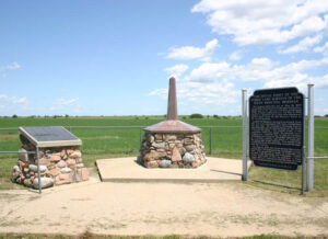 Public land survey monument near Mahaska, Kansas.