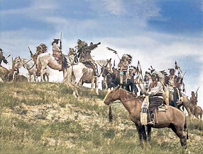 Planning an Indian Raid by Edward S. Curtis, 1907.