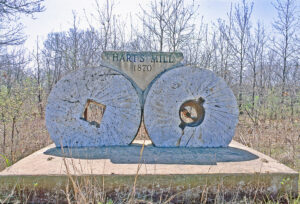 Millstones mark the site of old town of Harts Mill, Kansas, courtesy Kansas Geological Survey.