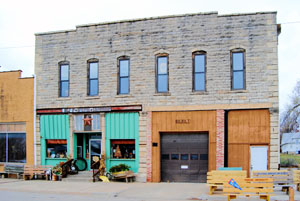 Business buildings in Eskridge, Kansas by Kathy Alexander.