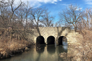 Stone arch bridge at Lake Wabaunsee, Kansas, courtesy Wikimedia.
