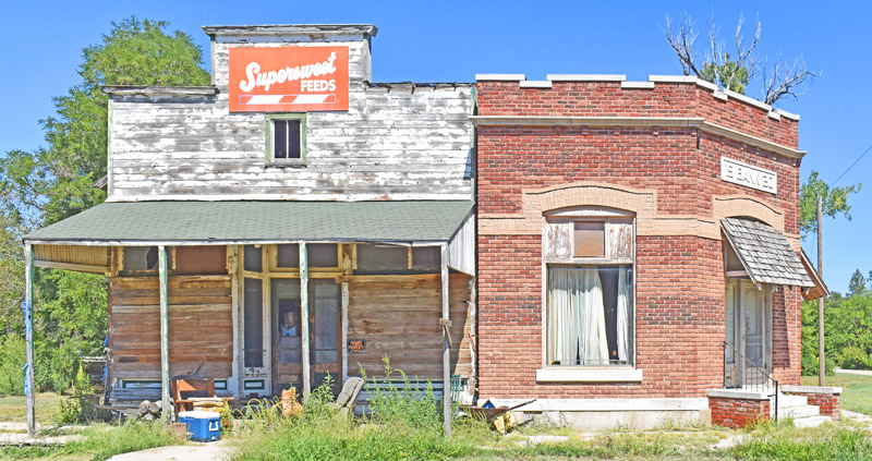 Old business buildings in Ludell, Kansas by Kathy Alexander.