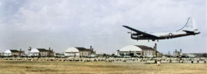 Smoky Hill Army Air Base hangars as a B-29 prepares to land, about 1943.