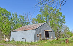 Old metal barn in Valeda, Kansas by Kathy Alexander.
