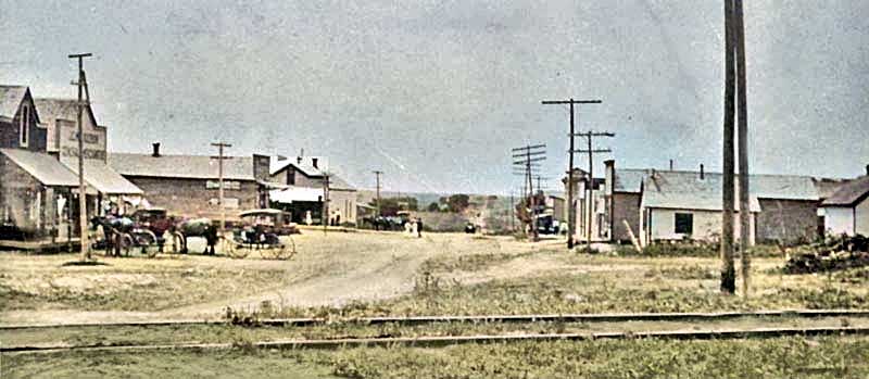 Old Main Street in Brownell, Kansas, around 1905. Touch of color by LOA.