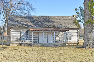 The old 1867 Oswego Log House still stands, photo by Kathy Alexander. The old 1867 Oswego Log House still stands, photo by Kathy Alexander.