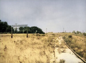 Atchison, Topeka & Santa Fe Railroad sign board in Ransomville, Kansas. Photo by H. Killam, 1959.
