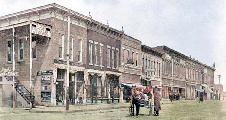 The West side of Courthouse Square in Fredonia, Kansas, 1905.