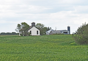 An old one-room school and other buildings in Gretna, Kansas, by Kathy Alexander.