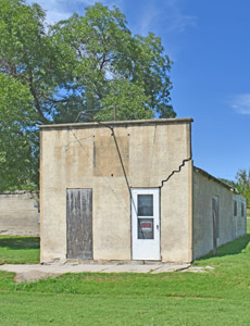 Old business building in Speed, Kansas by Kathy Alexander.