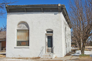 An old business building in Arnold, Kansas by Kathy Alexander.