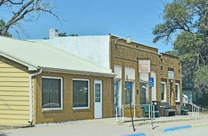 Business buildings in Hanston, Kansas by Kathy Alexander.